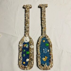 Set of Two Seashell and Crushed Blue Glass Decorative Paddles